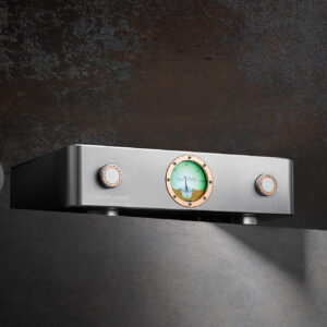 Audio photography of a sleek, modern amplifier with illuminated dials and knobs, set against a textured dark background with dramatic lighting.